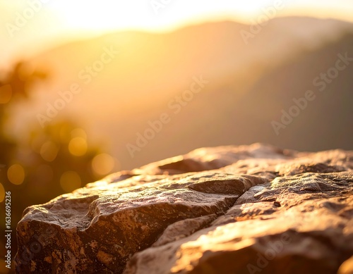 Rocky summit at golden sunset