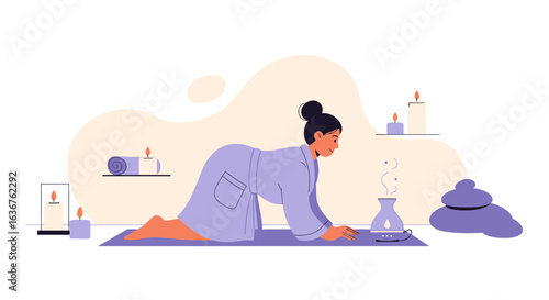 Woman in robe enjoying aromatherapy and spa day creating a peaceful ambience at home