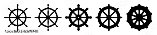 Collection of five black ship wheels or nautical steering wheels variations