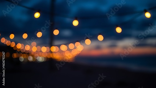 Beachside ambiance with glowing string lights creating a warm sunset atmosphere.