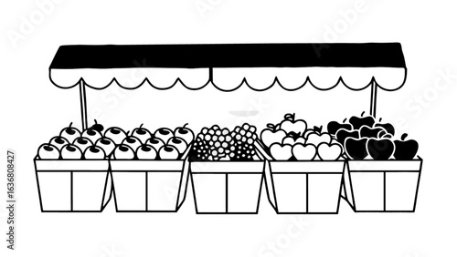 Fresh fruit market stall with apples, grapes, and cherries, perfect for healthy eating concepts