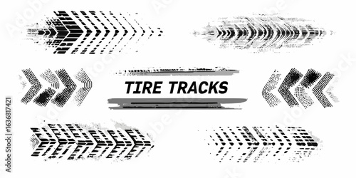 Collection of grungy black tire tracks and markings