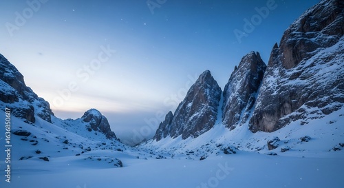 Majestic Snowy Mountain Peaks Under a Clear Blue Sky, Winter Landscape.