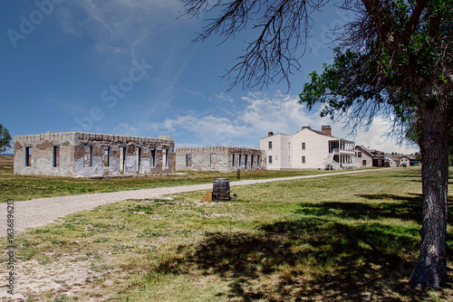 Фотография View down the Parade Ground of Officers' Quarters Ruins and Old Bedlam at Fort Laramie National Historic Site in Wyoming