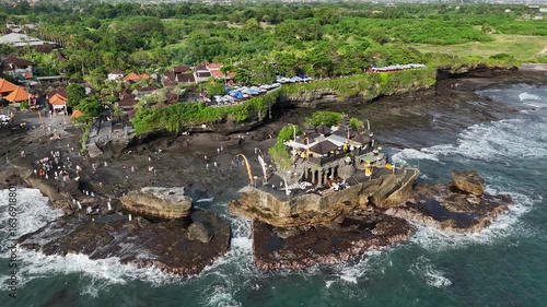 Aerial View of Pura Tanah Lot Temple and Blue Ocean Waves, Bali, Indonesia