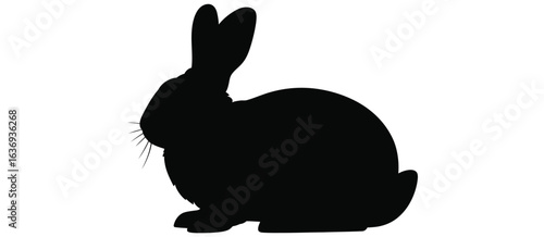Black silhouette of a rabbit sitting upright against a white background