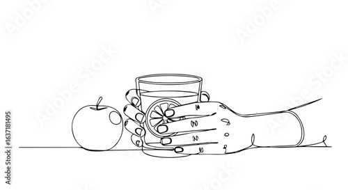Detox drink in glass with lemon slice held by hand next to apple. Healthy detox beverage refreshment for wellness lifestyle. Concept detox image for blog, social media, or health website.