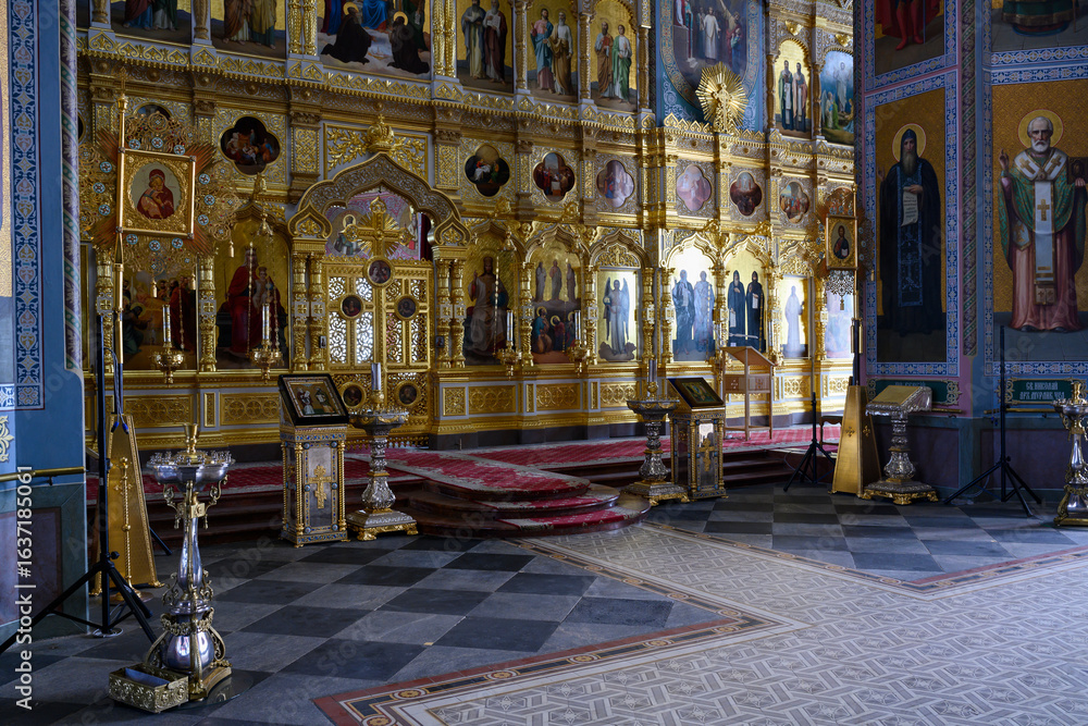 Obraz premium Interior of the medieval Christian Transfiguration Cathedral with altar, icon and paintings on the island of Valaam in Karelia