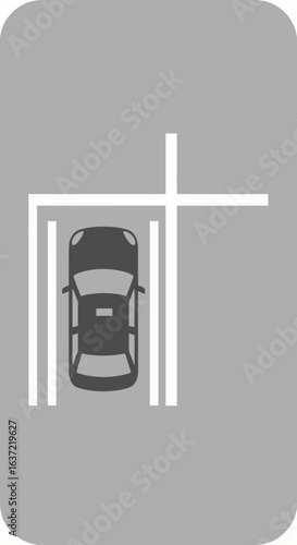 Overhead view of a car parked within designated parking lines on a grey surface, indicating a parking space.