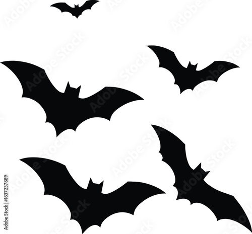 Flying Black Bat Silhouettes Isolated on White