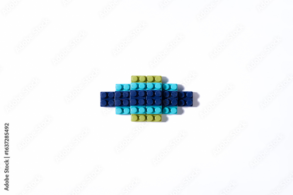 Fototapeta premium Abstract Sun Shape Made of Colorful Building Blocks