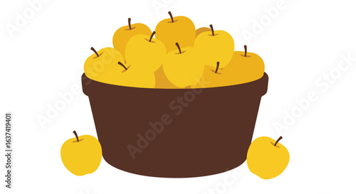 Pot full of golden apples with two loose apples resting near dark brown pot