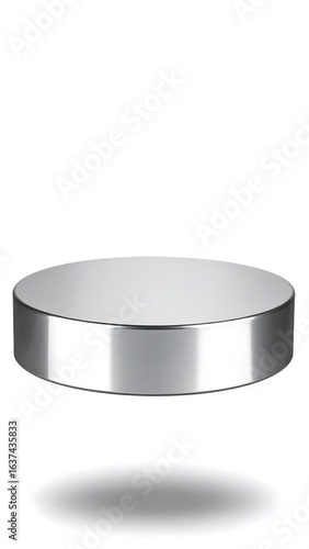A sleek, silver, cylindrical object, subtly reflective, casts a slight shadow