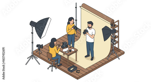 Teamwork in studio Three photographers review photos, light & backdrop setup