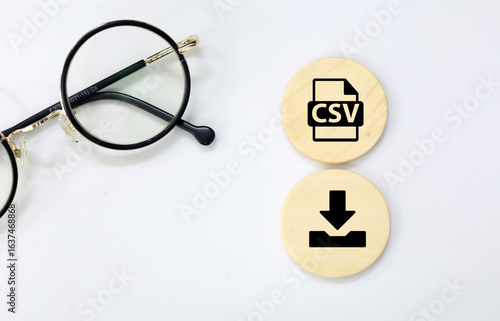 wooden square with CSV format file icon and download. the concept of saving a pdf file. concept pdf file save format