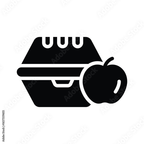 A glyph icon of lunch box and apple
