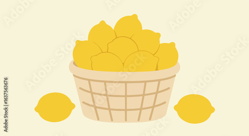 Basket overflows w/ yellow lemons; two lemons sit at its base on cream background