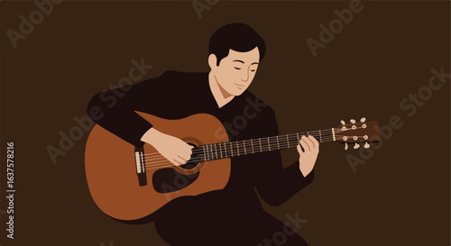 Musician plays the acoustic guitar in dark clothing against a dark backdrop