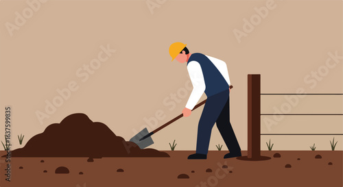 Working the soil Man digs dirt with shovel near fence, wearing safety hat in a field