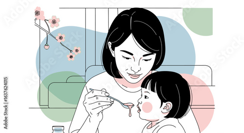 A mother carefully feeds her young child with a spoon, creating a tender moment.