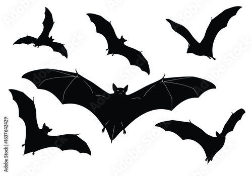 A group of spooky black bat silhouettes in various flight poses isolated on a white background.