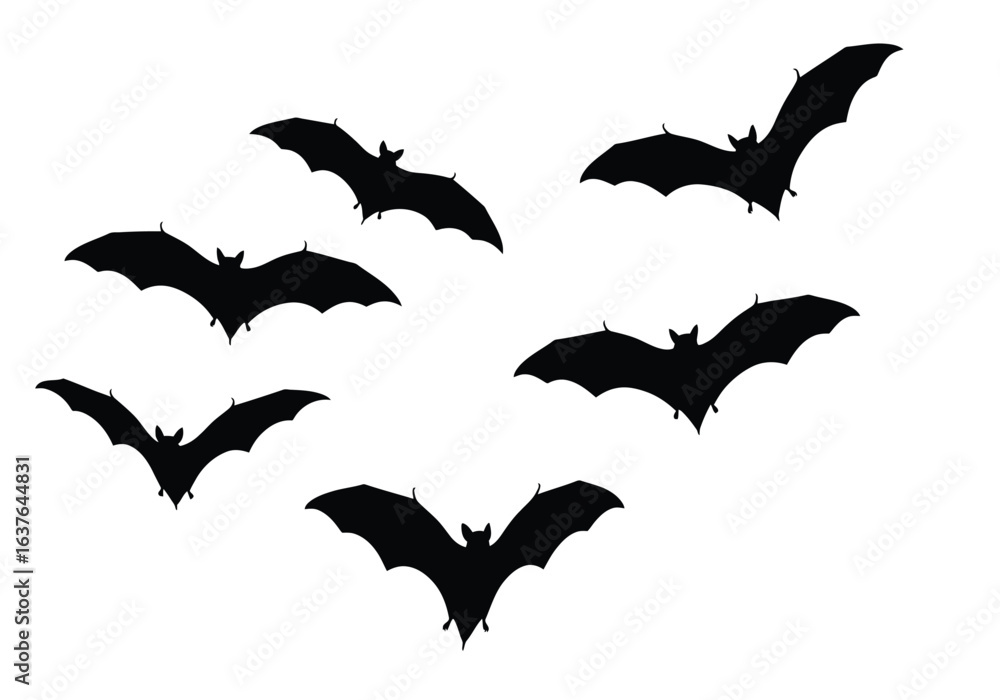 Naklejka premium Silhouette of a flock of bats in flight against a white background.