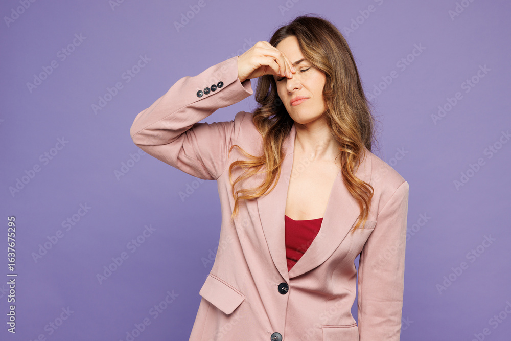 Young sick ill sad exhausted tired woman wear beige jacket formal clothes keep eyes closed rub put hand on nose isolated on plain pastel light purple wall background studio portrait Lifestyle concept Young sick ill sad exhausted tired woman wear beige jacket formal clothes keep eyes closed rub put hand on nose isolated on plain pastel light purple wall background studio portrait Lifestyle concept