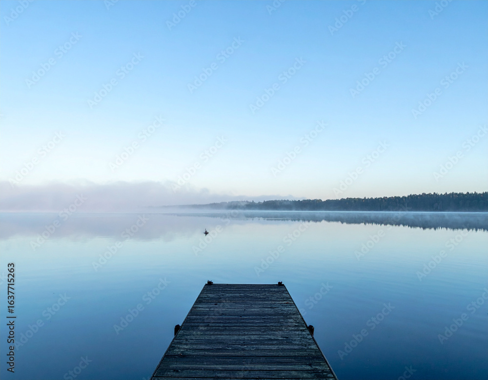 Fototapeta premium Minimalist Lake with Dock and Misty Morning Reflections