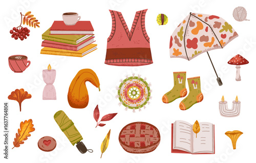Autumn and fall set of knitted waistcoat sweater, coffee, pie and umbrella. Dry orange leaves and forest berry collection