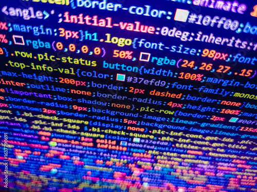 Website Coding. Developing programming binar. Shallow depth of field. Abstract pieces of PHP code of sale system. Software development creating projects. HTML website structure