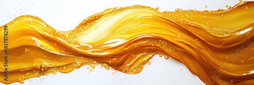 Flowing Golden Honey Texture with Glorious Swirls and Gleaming Drops on White Background