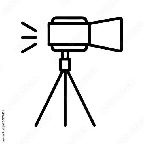 Studio lighting equipment on tripod with beam of light  