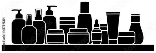 Shelf holding books and decorative items with folded clothes beauty products