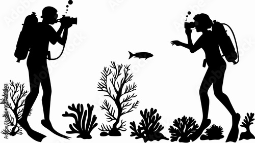 Silhouette illustration of two scuba divers taking pictures near coral and a fish in the ocean water | editable eps vectors