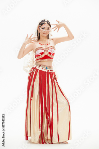 Belly dancers dressed in traditional Indian costumes