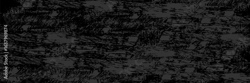 Old cracked dark gray concrete wall wide texture. Gloomy grunge long panoramic black background