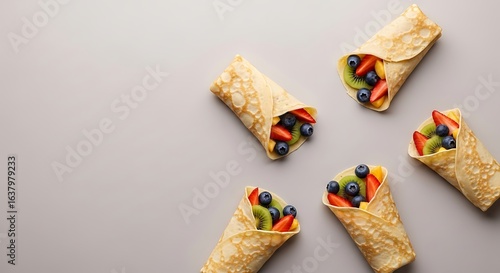 Delightful assortment of crepes filled with fresh tropical fruits creating a balanced gourmet