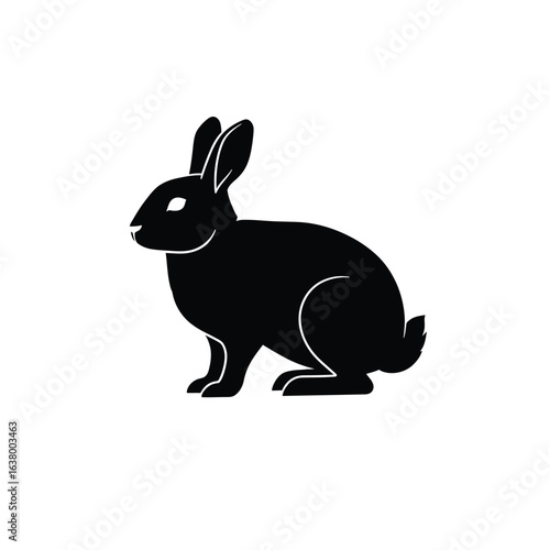 Black silhouette of a rabbit sitting on a white background
