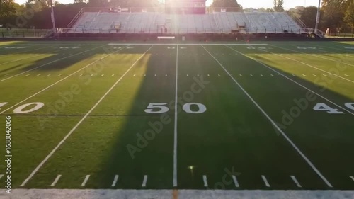 Aerial view of American football field, perfect in morning light