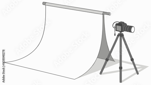 Photography Studio Setup with Camera and Backdrop.