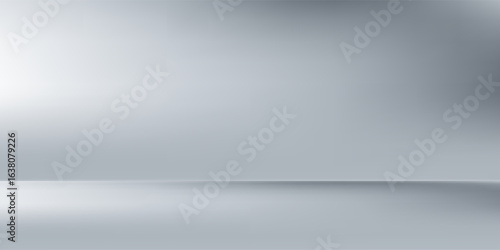 Elegant minimalist grey studio background with soft gradient lighting and smooth reflective floor, perfect for product display, mockups, presentations, and modern design projects.