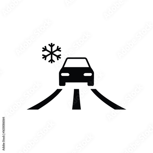 Car driving in snowy conditions on a road