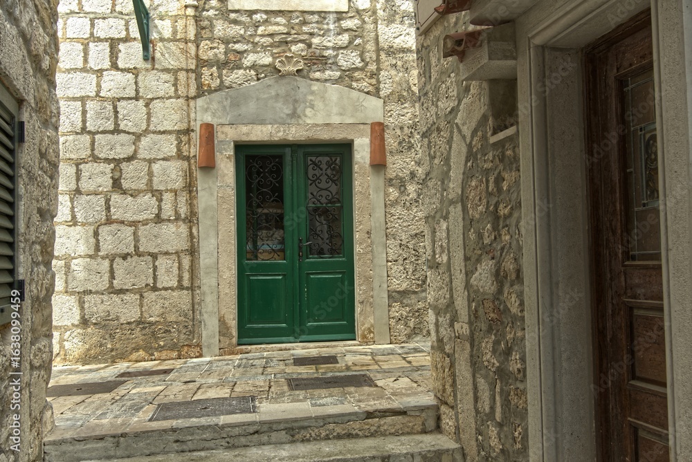 Old town of Rab in Croatia with narrow streets. Old town of Rab in Croatia with narrow streets.