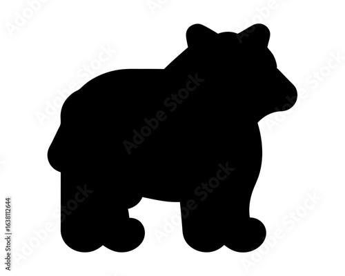 Silhouette of a powerful bear standing on its hind legs