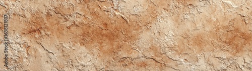 Textured, light brown and beige stone or tile surface