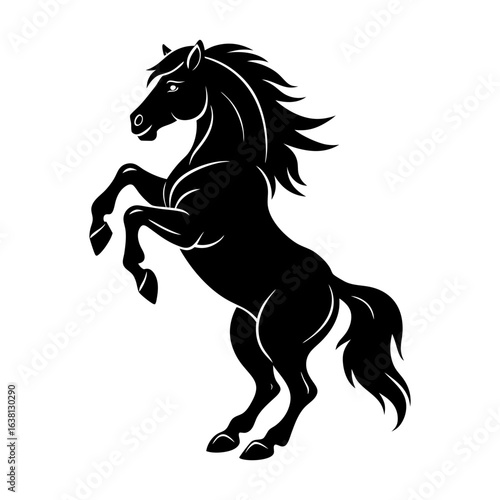 Silhouette of a majestic black horse rearing up on its hind legs proudly