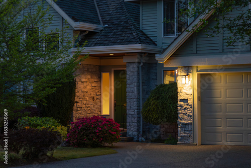 Wallpaper Mural Fragment of luxury house with nice green Summer landscape at night in Vancouver, Canada, North America. August 2025. Torontodigital.ca