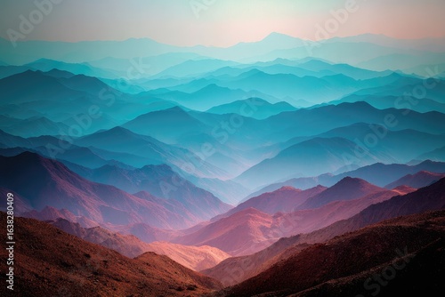 Layered mountain ranges in soft, pastel hues
