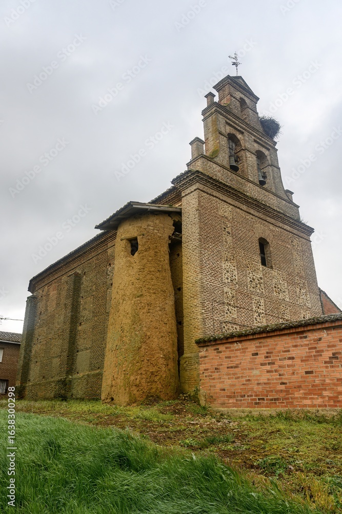 Fototapeta premium Church of San Andres in San Andres de la Regla with brick bell tower, Palencia