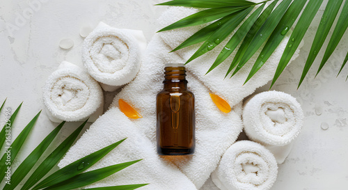 Elevated spa experience: a tranquil arrangement featuring a tincture bottle, fresh towels, botanical accent and delicate floral details creating a refreshing zen ambiance ideal for wellness